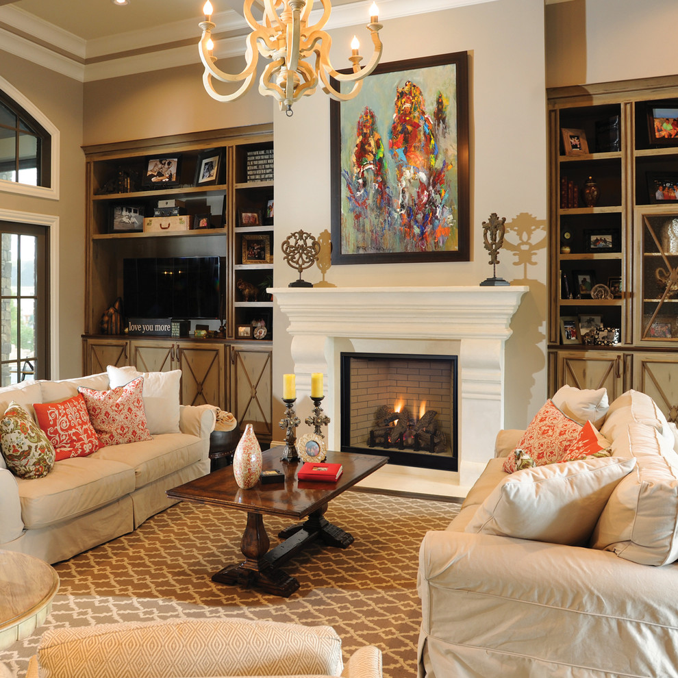 Traditional formal living room in Orange County with a standard fireplace and beige walls.