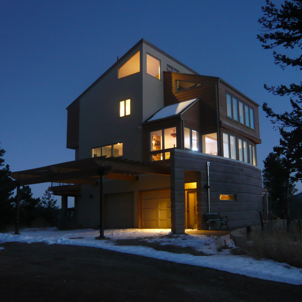 Contemporary exterior in Denver with wood siding.