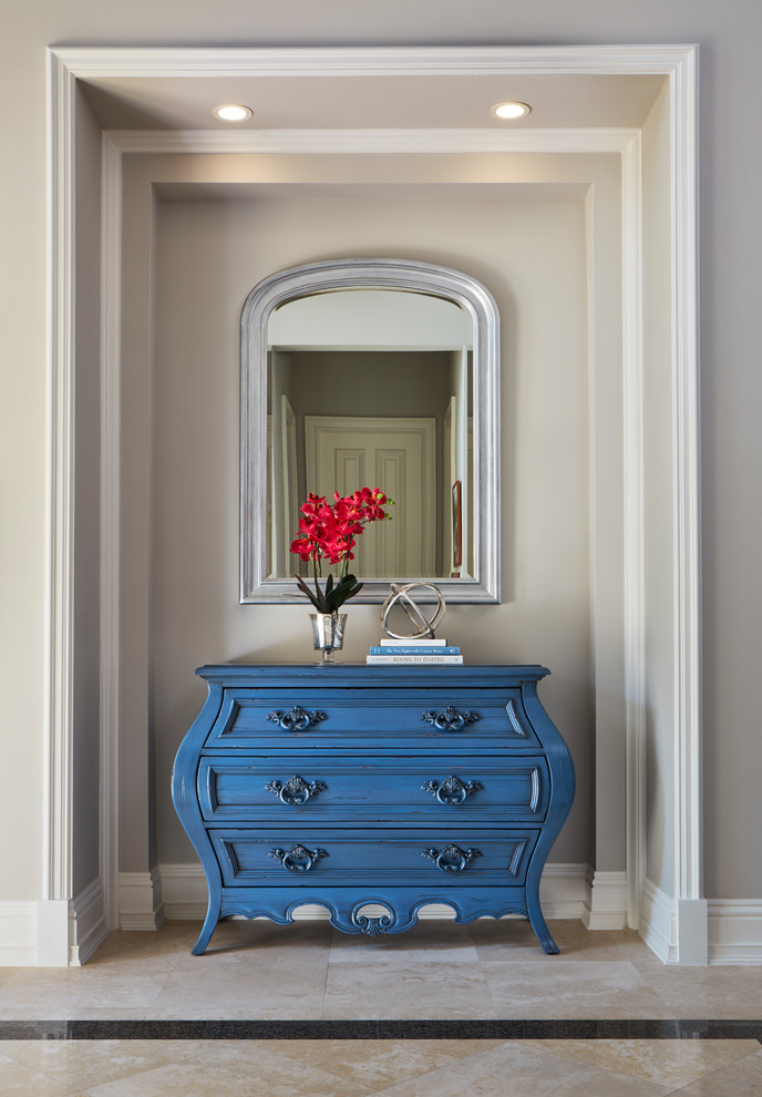 Mid-sized transitional foyer photo in Miami with gray walls