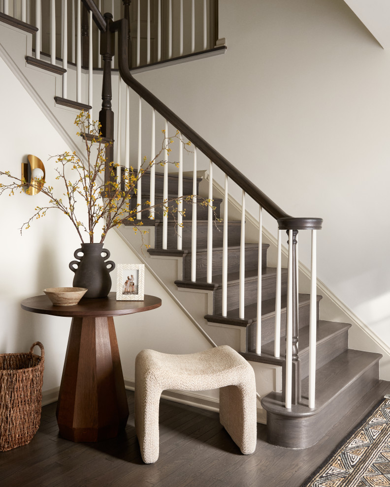 Mid-sized transitional wooden l-shaped wood railing staircase photo in DC Metro with wooden risers