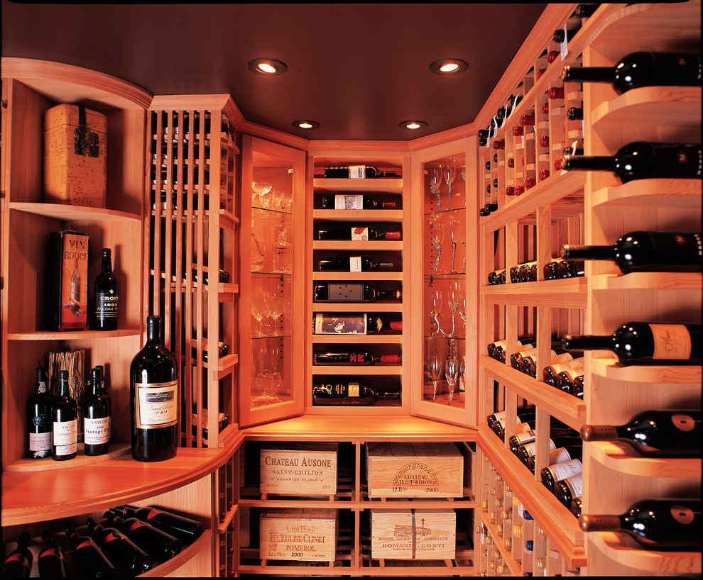 Design ideas for a large traditional wine cellar in San Diego with marble floors and diamond bins.