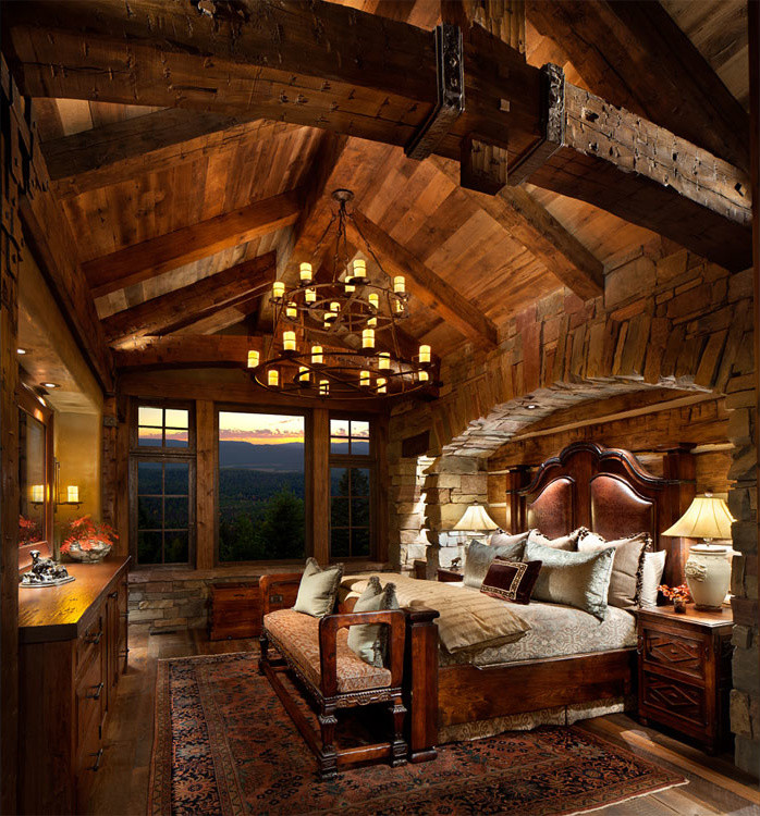 Example of a mountain style bedroom design in Other