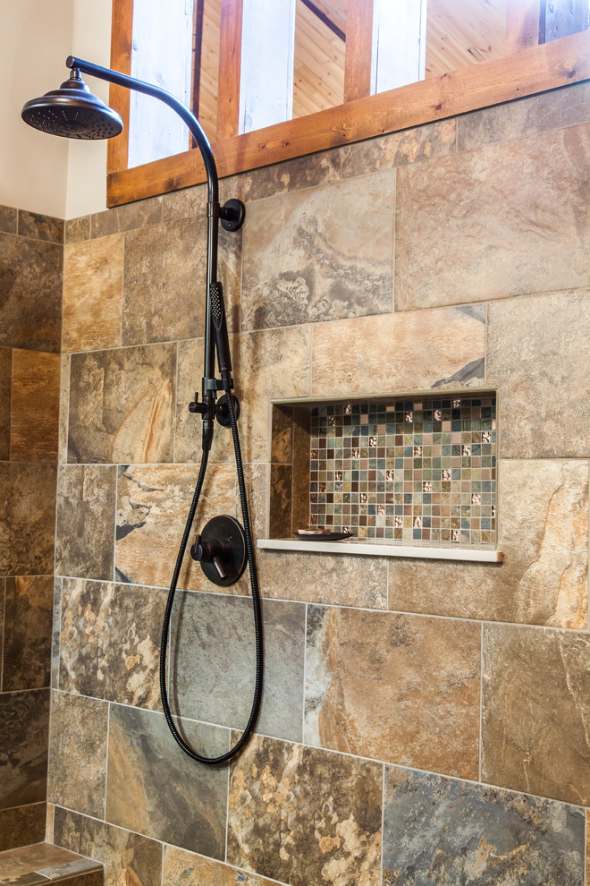 Example of a mid-sized mountain style master porcelain tile and multicolored tile porcelain tile and multicolored floor freestanding bathtub design with a vessel sink, shaker cabinets, quartz countertops, a one-piece toilet, gray walls and dark wood cabinets