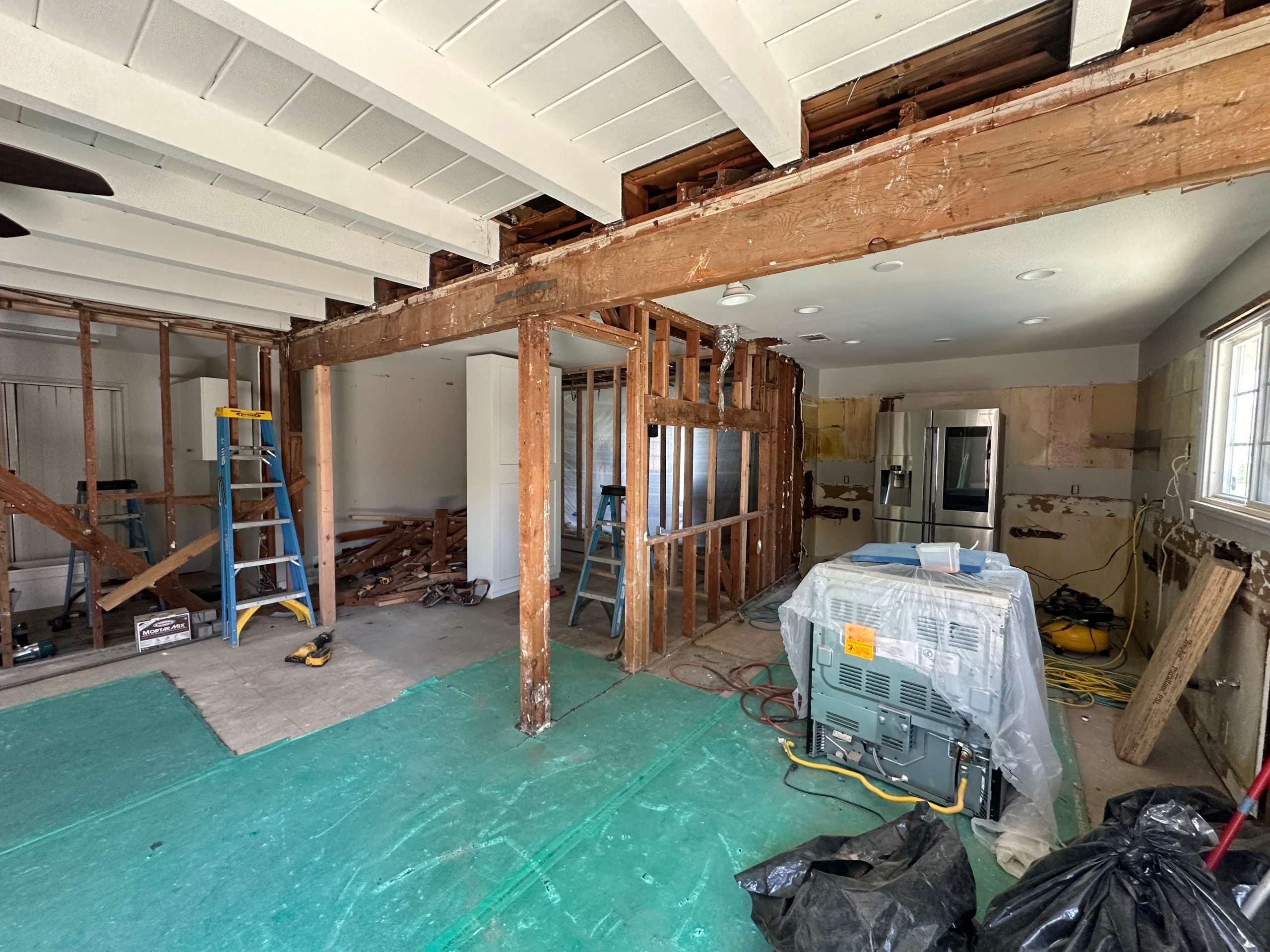 Kitchen & Living Space gutted for framing remodel