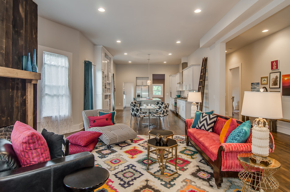 Photo of an eclectic formal open concept living room in Nashville with grey walls, dark hardwood floors and brown floor.