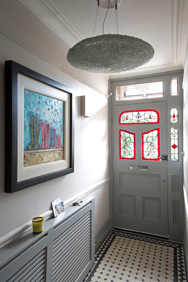 Photo of a transitional entryway in London.