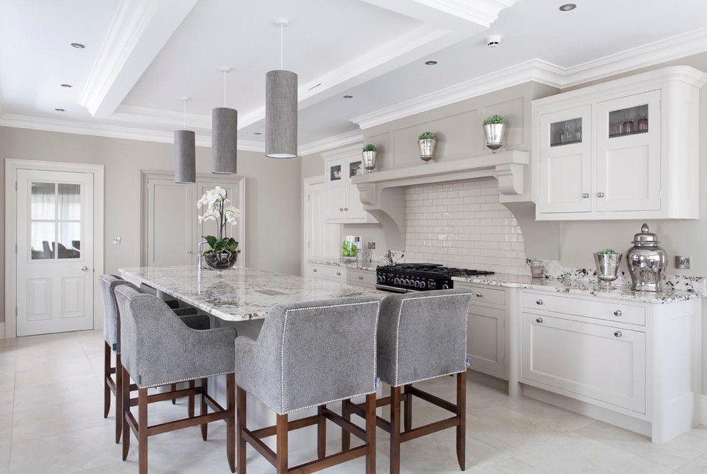 Inspiration for a large transitional open plan kitchen in Other with an integrated sink, beaded inset cabinets, grey cabinets, granite benchtops, beige splashback, subway tile splashback, panelled appliances, ceramic floors and with island.