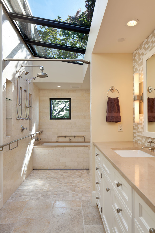 Design ideas for a traditional bathroom in Seattle with beige tile.