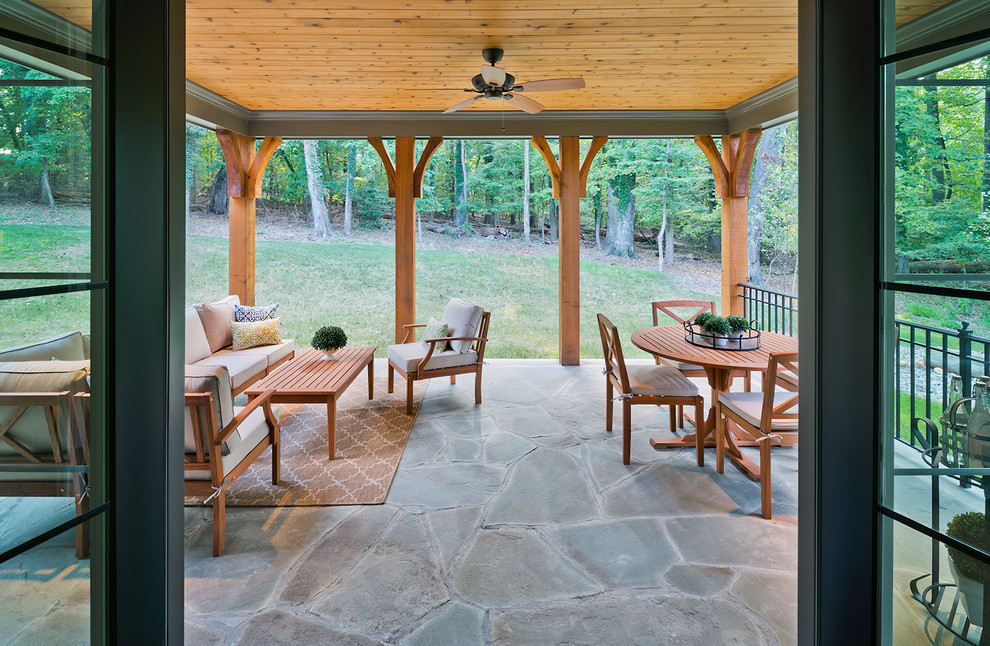 Design ideas for a large country backyard deck in DC Metro with a roof extension.