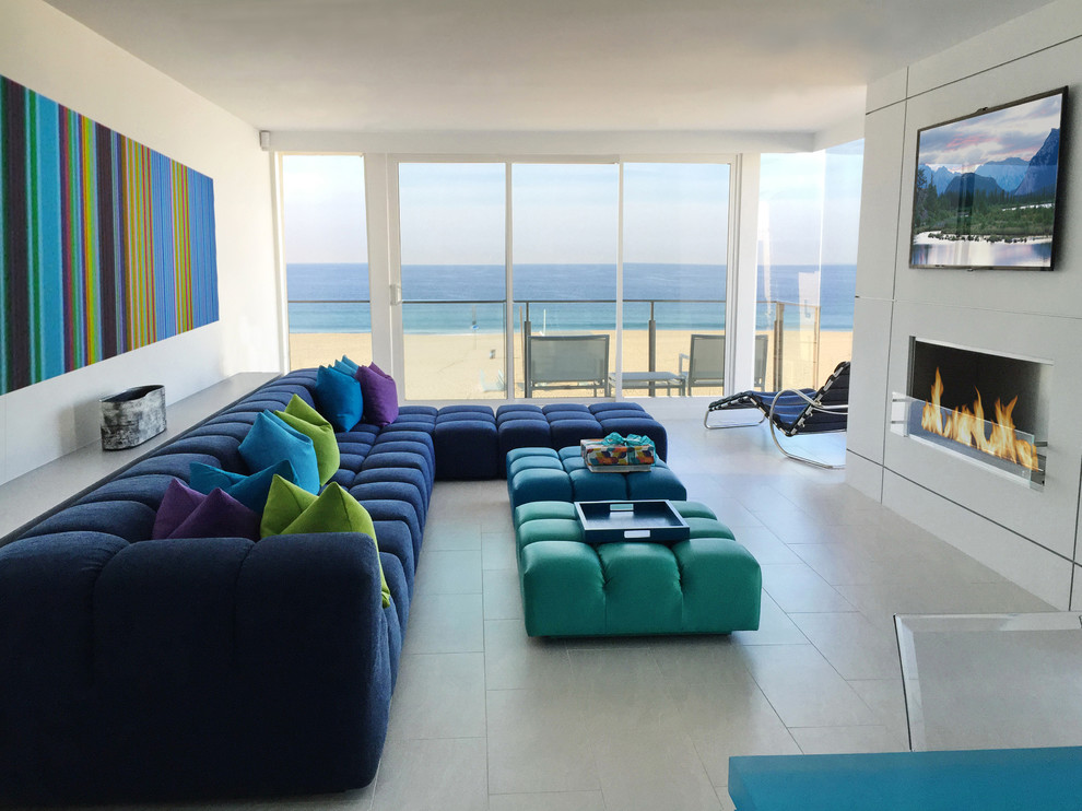 Living room - large contemporary open concept porcelain floor living room idea in Los Angeles with white walls, a ribbon fireplace and a wall-mounted tv