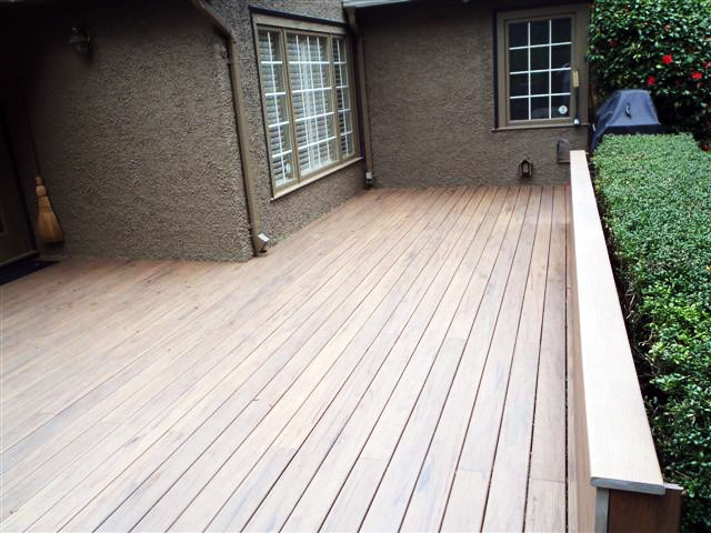 Deck - mid-sized modern backyard deck idea in Vancouver with no cover