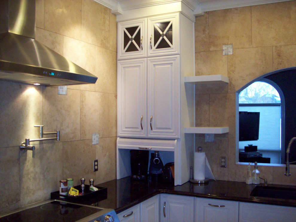 Inspiration for a transitional eat-in kitchen remodel with raised-panel cabinets, white cabinets, wood countertops and an island
