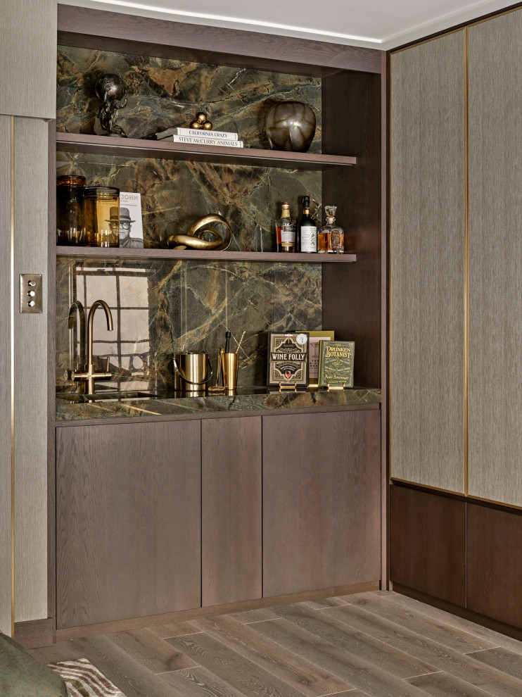 This is an example of a contemporary home bar in London.
