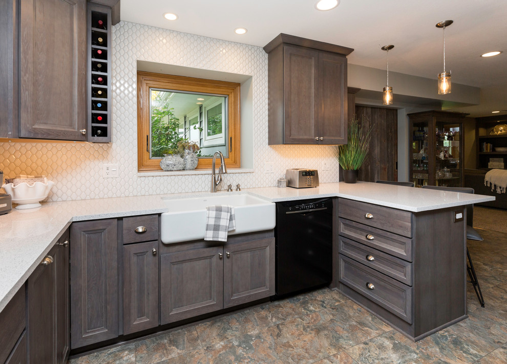 Inspiration for a mid-sized transitional l-shaped vinyl floor and gray floor eat-in kitchen remodel with a farmhouse sink, recessed-panel cabinets, gray cabinets, quartz countertops, white backsplash, ceramic backsplash, stainless steel appliances, no island and white countertops