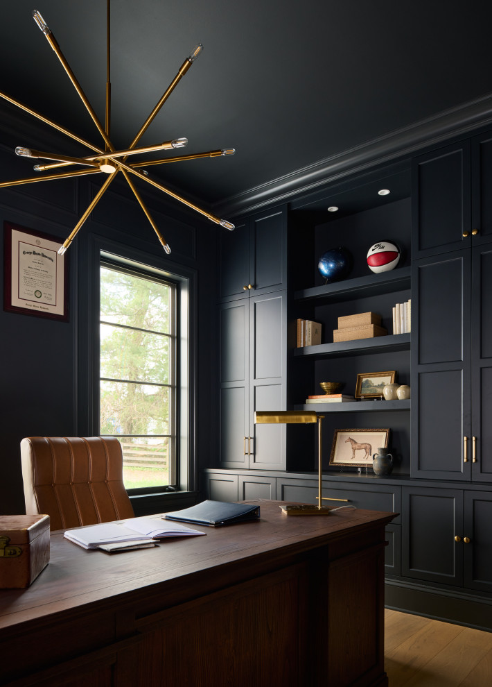 Example of a transitional home office design in Baltimore