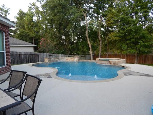 sloped yard above ground pool