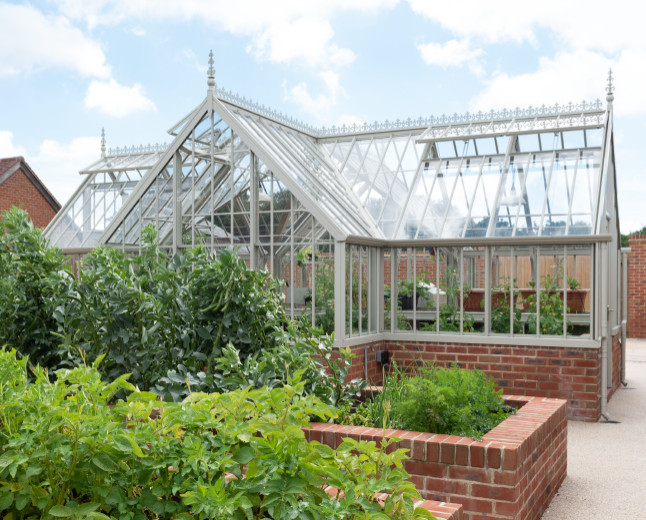 This is an example of a large traditional detached greenhouse in Hampshire.