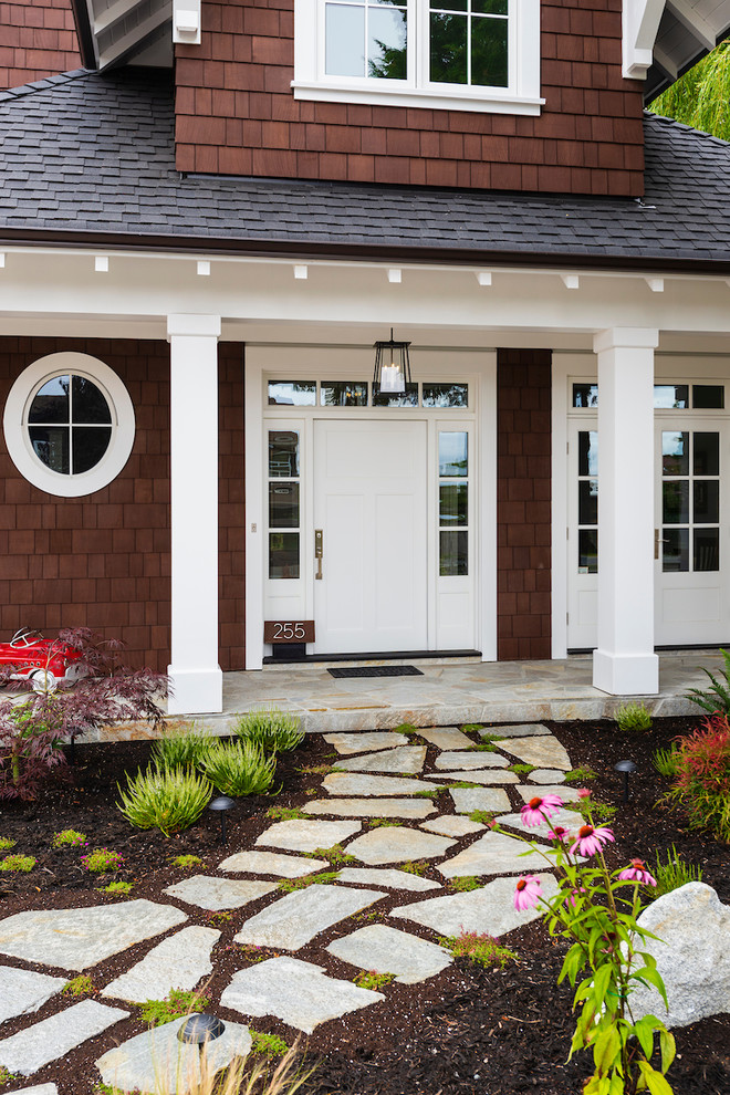 Mid-sized country front door in Vancouver with a single front door and a white front door.