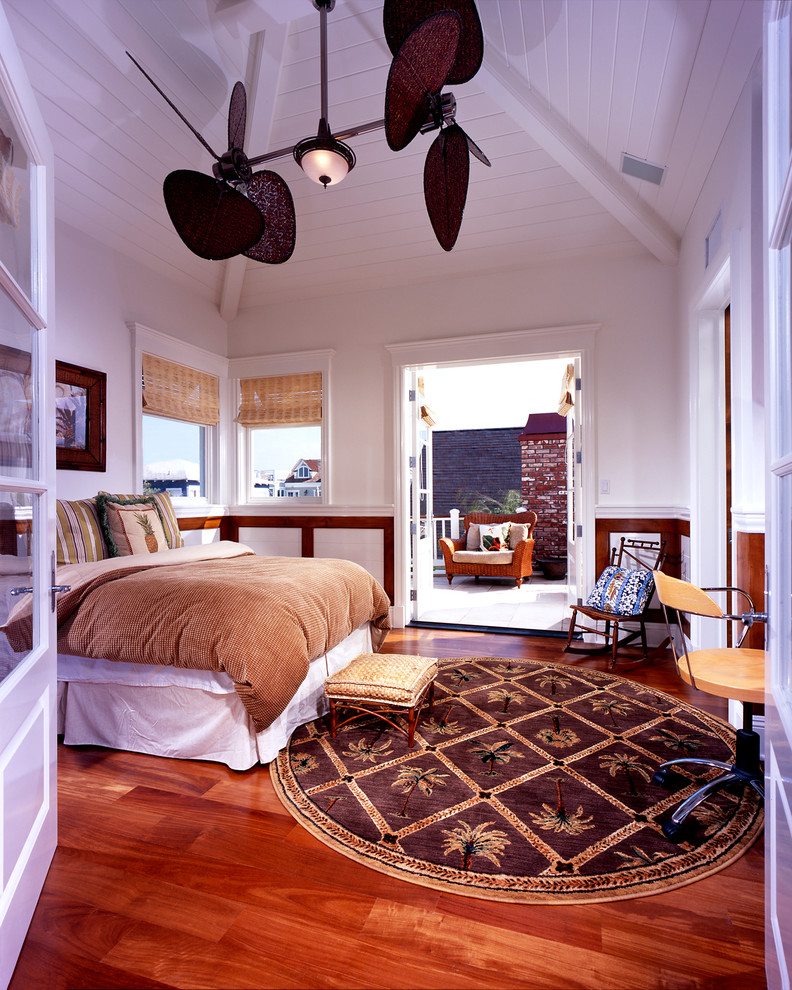 Inspiration for a traditional bedroom in Orange County with white walls.