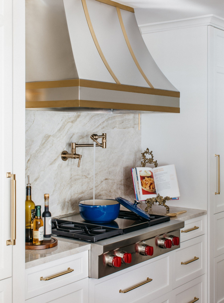 Example of a large transitional dark wood floor and brown floor eat-in kitchen design in Chicago with recessed-panel cabinets, quartzite countertops, beige backsplash, a peninsula and beige countertops