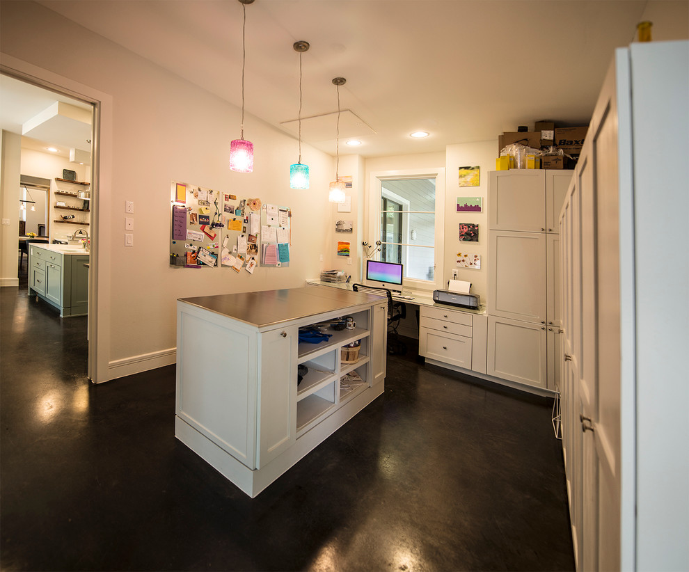 Photo of a transitional laundry room in Austin.