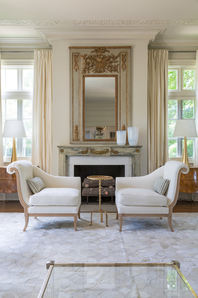 Inspiration for a timeless formal dark wood floor living room remodel in New Orleans with white walls, a standard fireplace and no tv