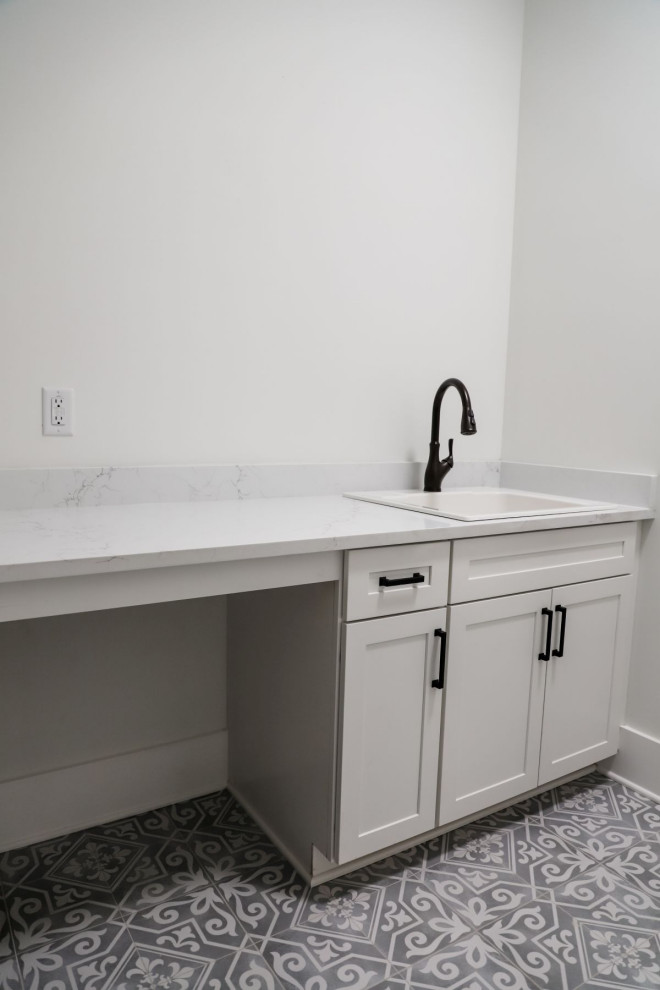 This is an example of a country utility room in Atlanta.