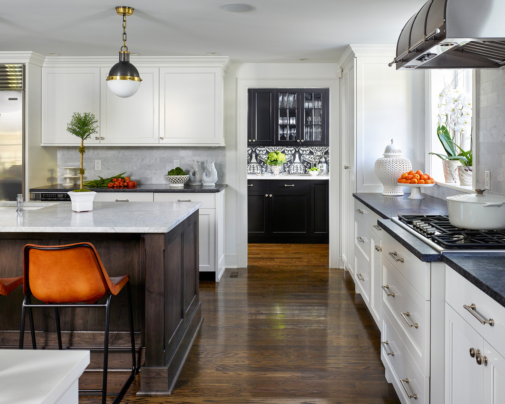 Design ideas for a transitional l-shaped separate kitchen in Philadelphia with recessed-panel cabinets, white cabinets, stainless steel appliances, dark hardwood floors and with island.