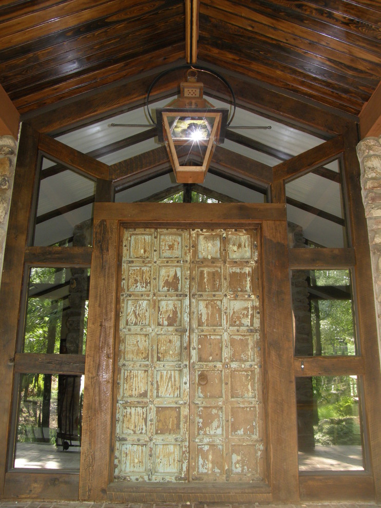 Inspiration for a mediterranean entryway remodel in Little Rock