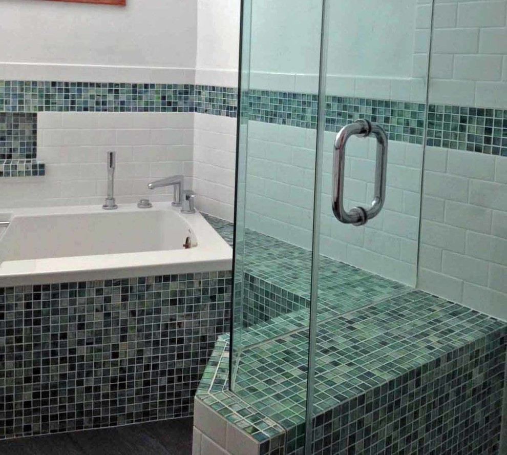 Mid-sized beach style 3/4 bathroom in Los Angeles with a drop-in tub, a corner shower, green tile, mosaic tile, white walls and a hinged shower door.