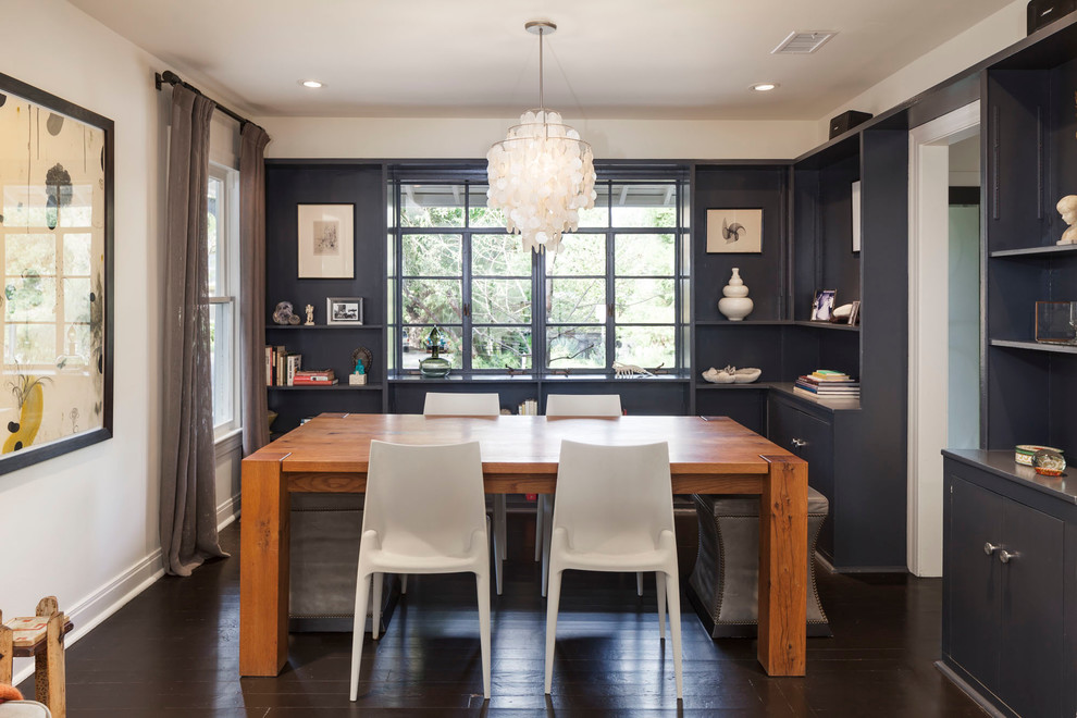 Example of a transitional dining room design in Austin