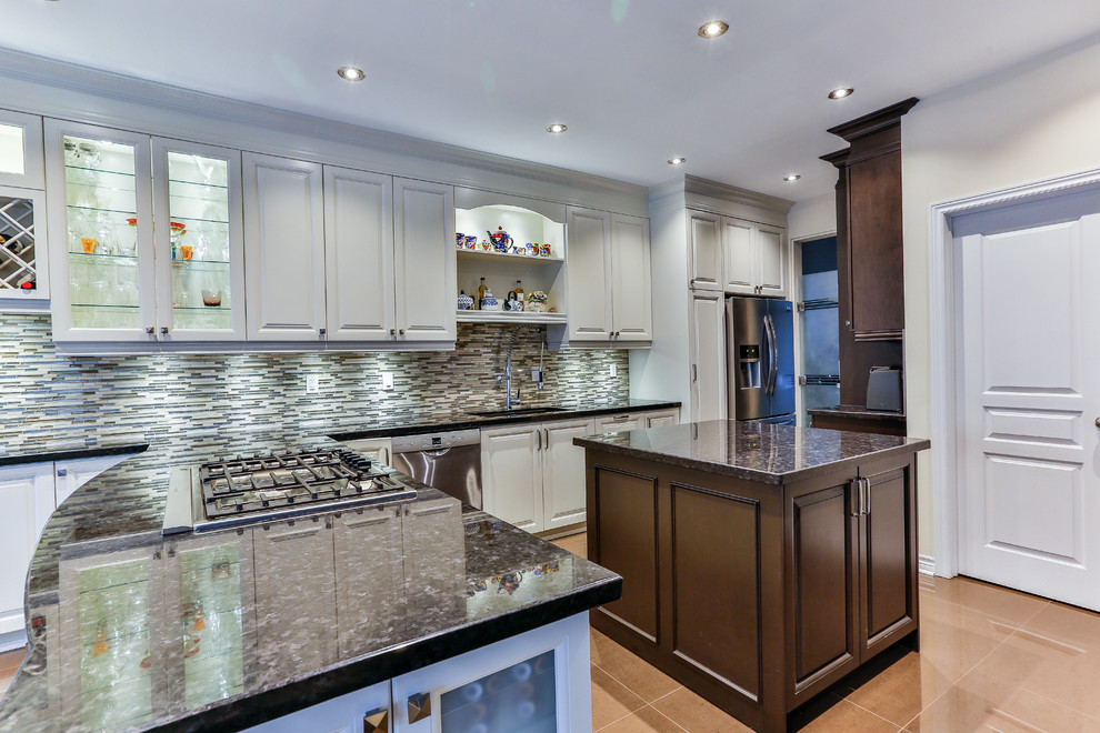 Example of a transitional kitchen design in Toronto