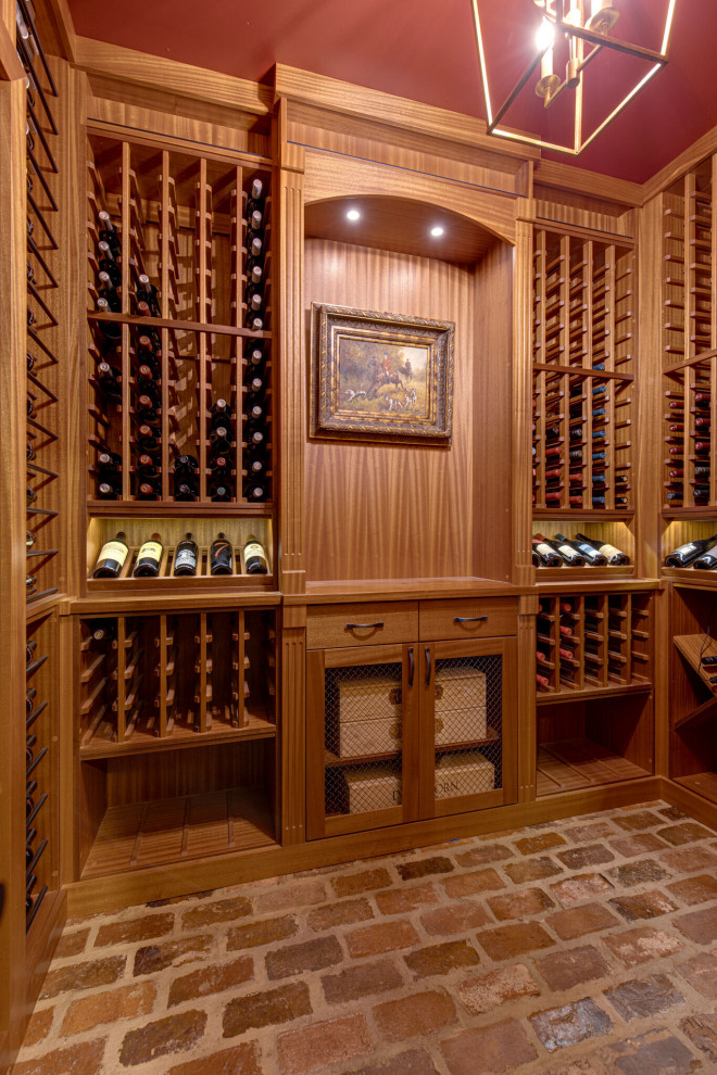 Secret passageway wine cellar. Basement layout with all mahogany racking.