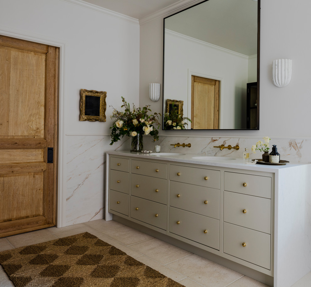 Example of a mid-sized french country master white tile and porcelain tile porcelain tile, white floor and double-sink freestanding bathtub design in Seattle with flat-panel cabinets, white cabinets, a two-piece toilet, white walls, an undermount sink, solid surface countertops, a hinged shower door, white countertops and a built-in vanity