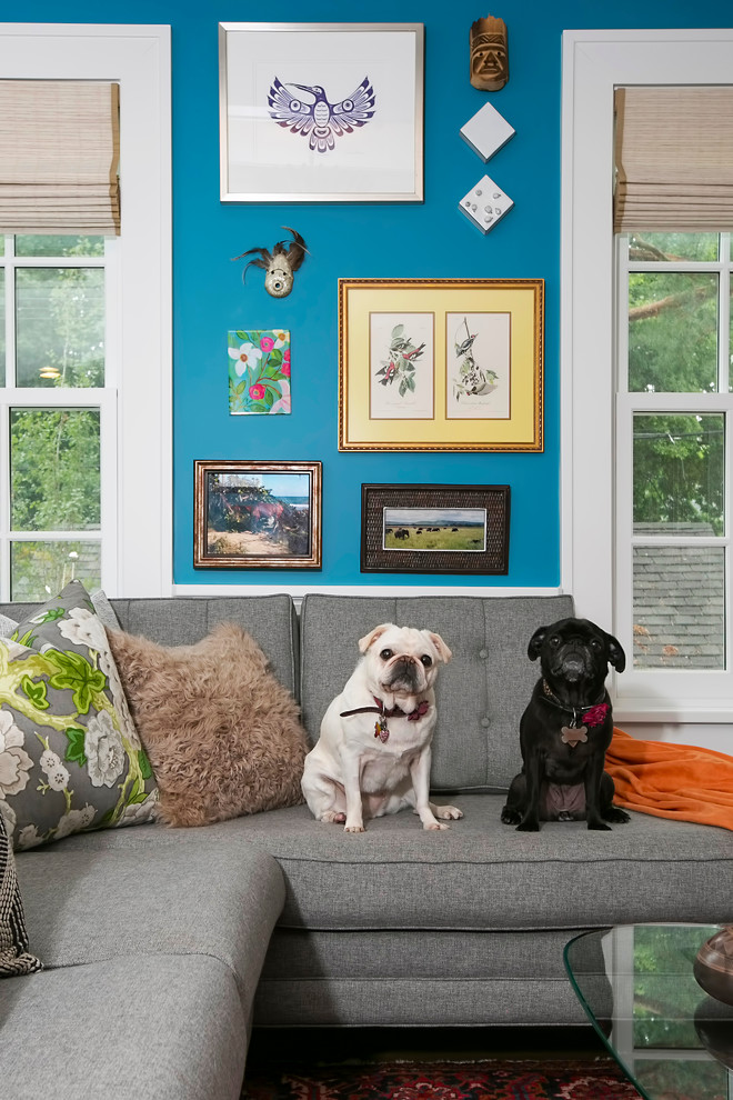Photo of an eclectic family room in Minneapolis with blue walls.
