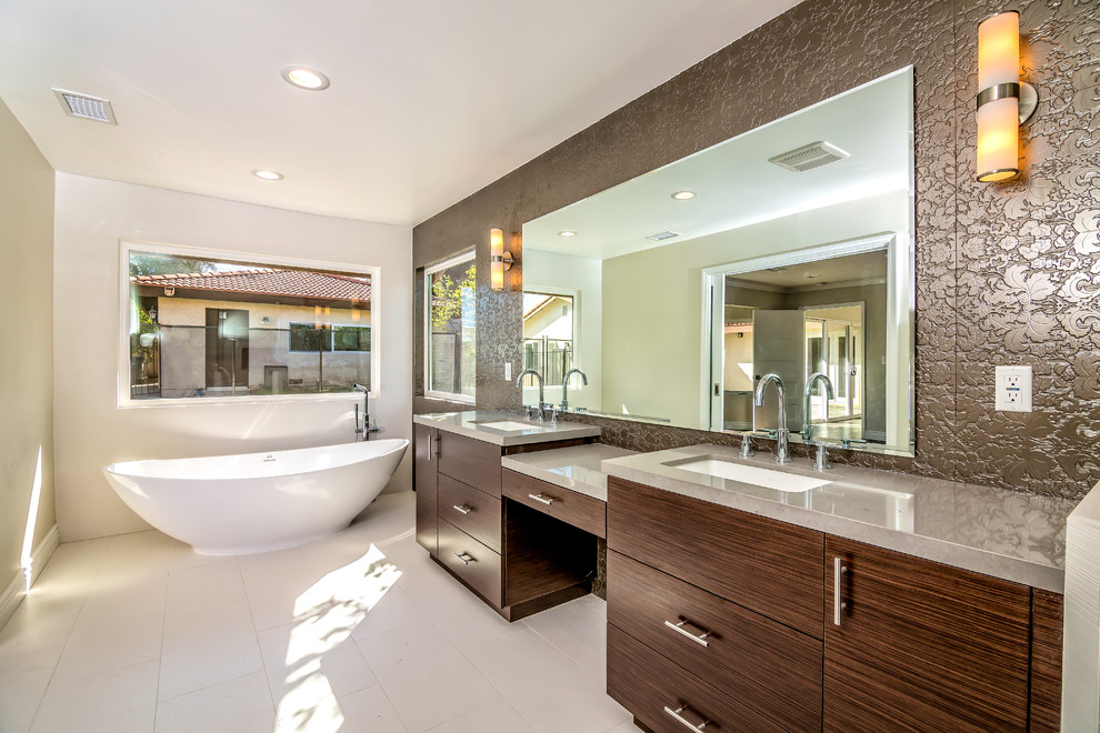 Large transitional master bathroom in San Francisco with flat-panel cabinets, dark wood cabinets, a freestanding tub, a two-piece toilet, beige tile, ceramic tile, beige walls, ceramic floors, an undermount sink, beige floor, a double vanity, engineered quartz benchtops, grey benchtops, a built-in vanity and wallpaper.