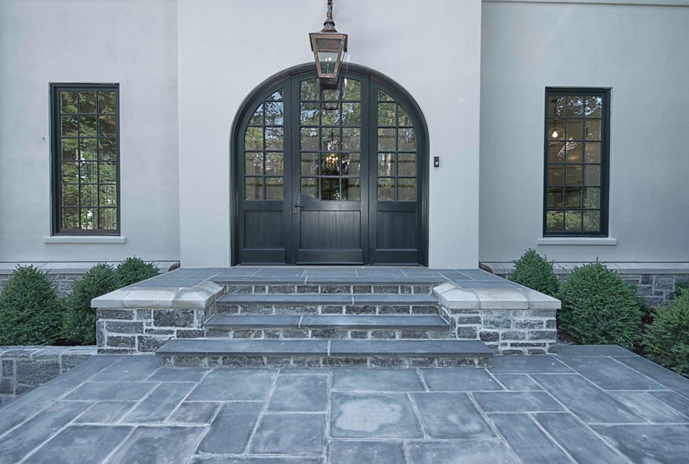Inspiration for a large transitional front door remodel in New York with a blue front door