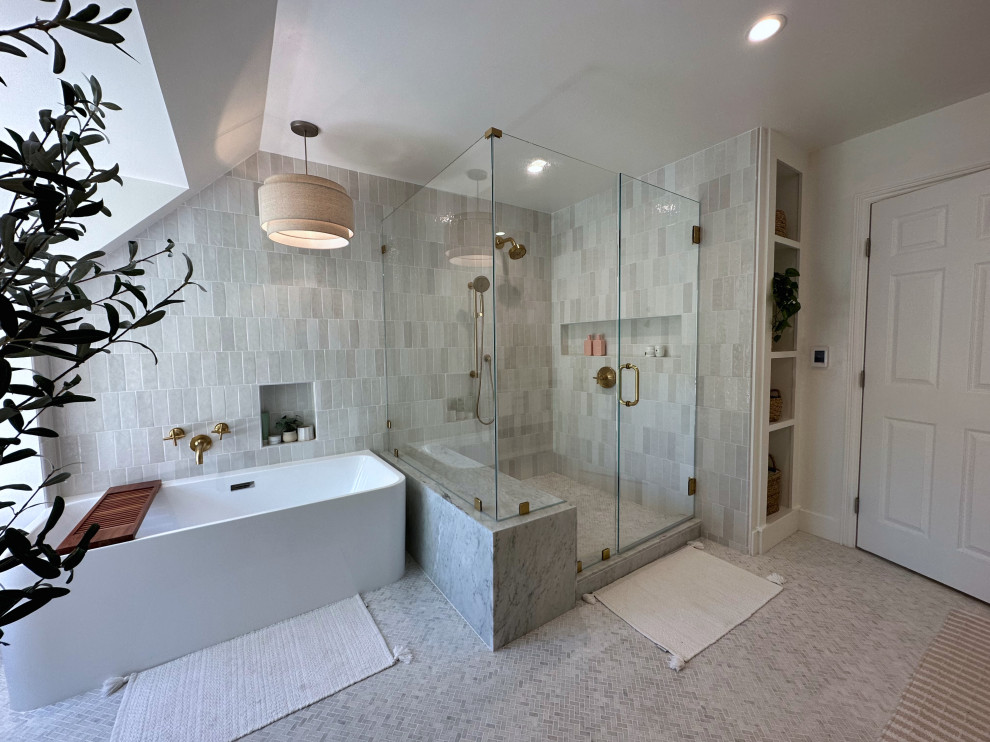 This is an example of a large modern master bathroom in San Francisco with a hot tub, an alcove shower, beige tile, ceramic tile, beige walls, mosaic tile floors, beige floor, a hinged shower door, a shower seat and vaulted.