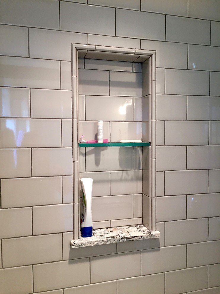 Small transitional master gray tile and porcelain tile porcelain tile home design photo in DC Metro with shaker cabinets, white cabinets, a two-piece toilet, green walls, an undermount sink and quartz countertops