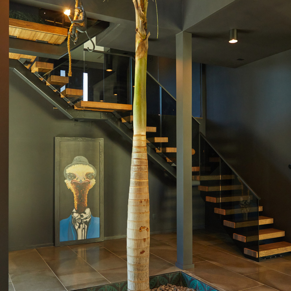 Idée de décoration pour un escalier design avec palier.
