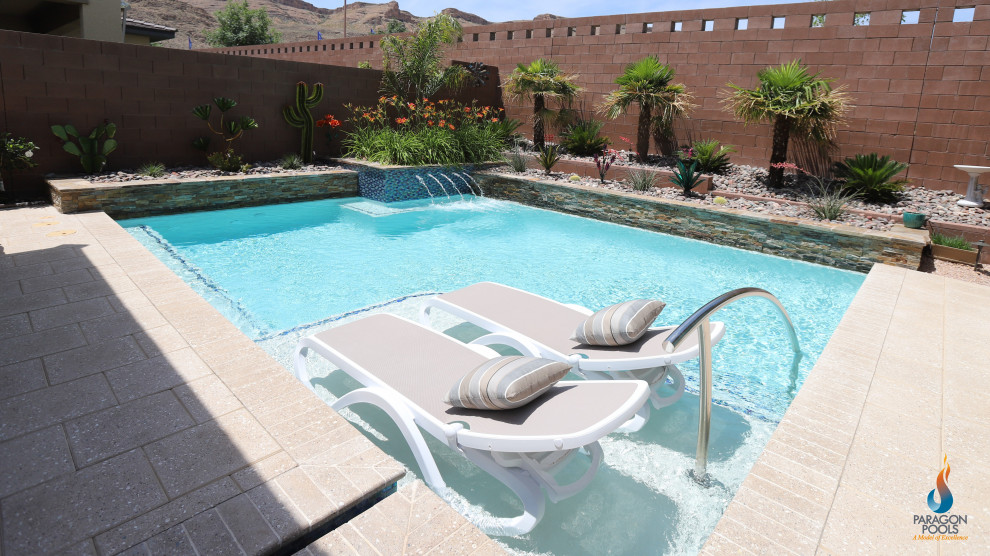 Inspiration for a mid-sized backyard pool remodel in Las Vegas