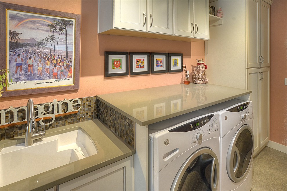 Design ideas for a large galley utility room in Seattle with an undermount sink, flat-panel cabinets, white cabinets, quartz benchtops, orange walls, ceramic floors and a side-by-side washer and dryer.