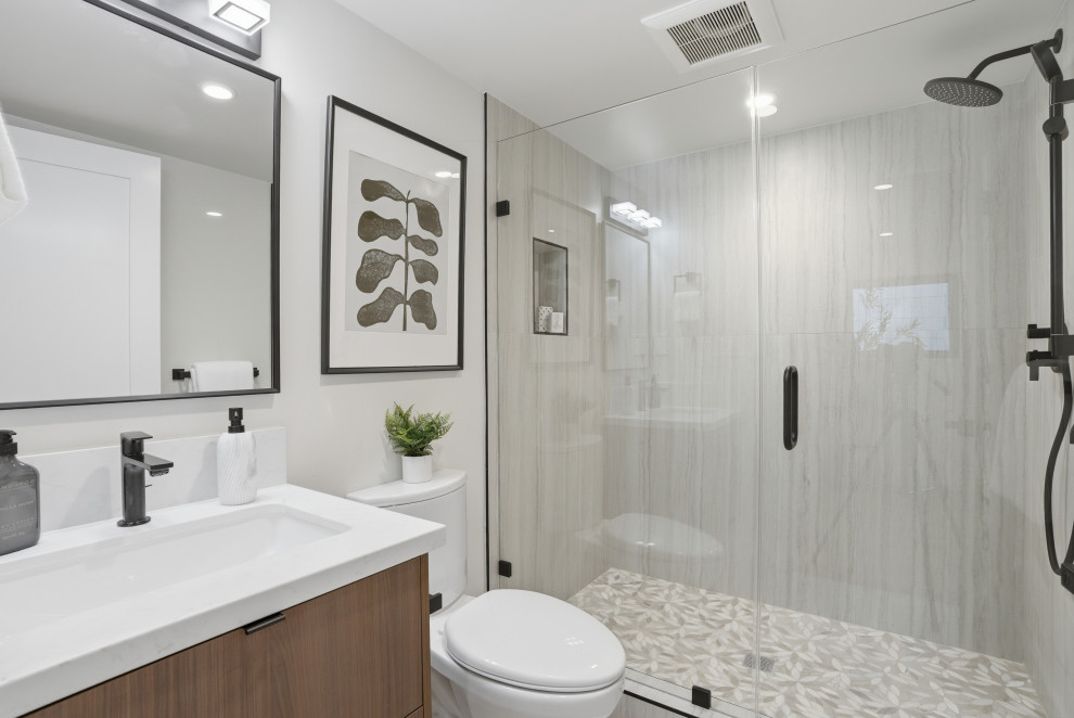 Compact ADU Bathroom with Walk-In Shower and Wood Vanity
