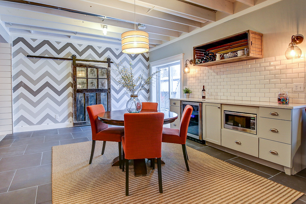 Mid-sized transitional open plan dining in Dallas with grey walls, porcelain floors, no fireplace and grey floor.