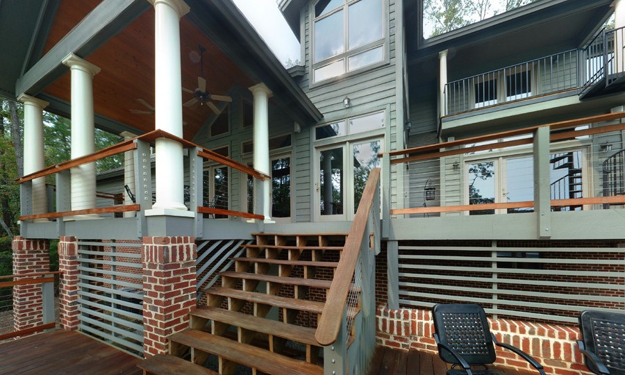 Portico, Decks, Stairs and Terraces cascade to Lakefront