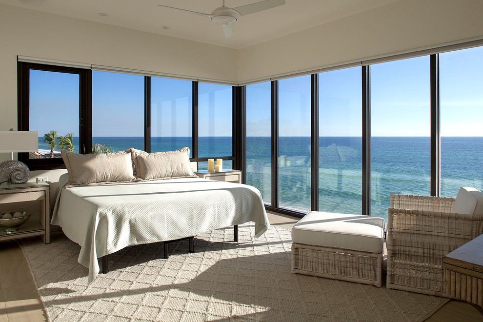 Beach style master bedroom in Miami.