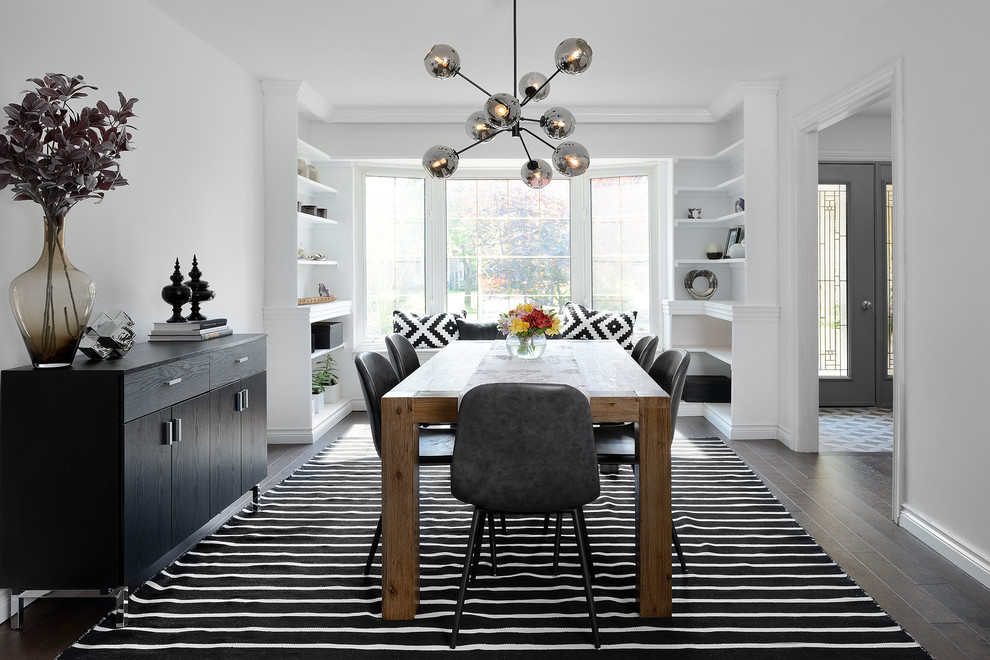 Inspiration for a modern medium tone wood floor and brown floor kitchen/dining room combo remodel in Toronto