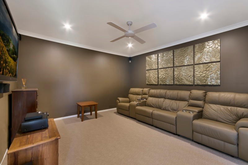 This is an example of a contemporary home theatre in Sunshine Coast.