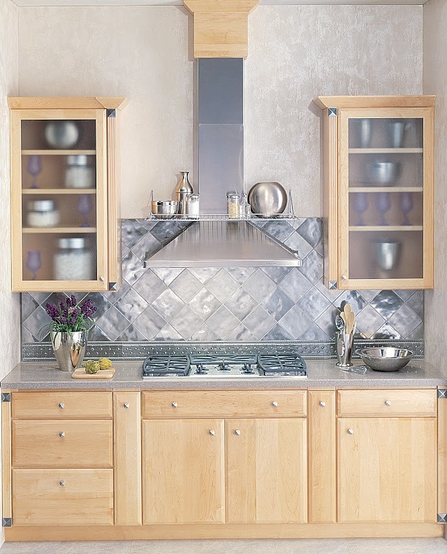 Example of a small transitional single-wall kitchen design in New York with flat-panel cabinets, light wood cabinets, wood countertops, metal backsplash, stainless steel appliances and no island