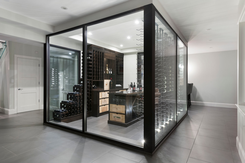 Photo of a large transitional wine cellar in Vancouver with porcelain floors and storage racks.